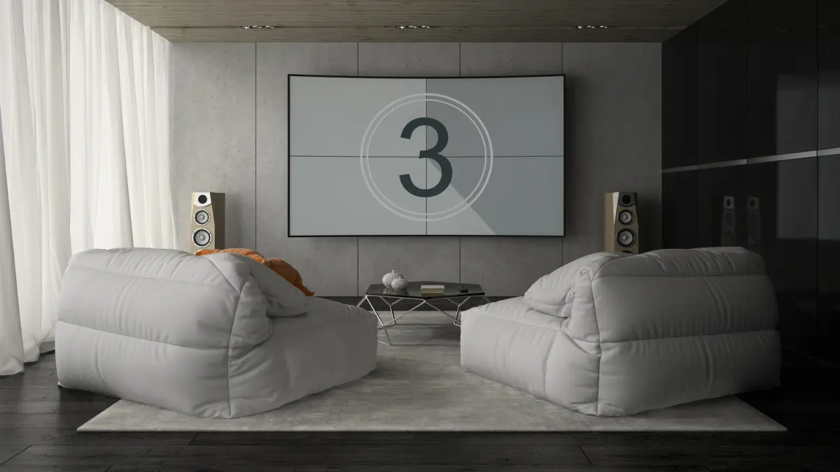 Home cinema - cinema em casa com telão de TV e duas poltronas confortáveis em ambiente acústico apropriado