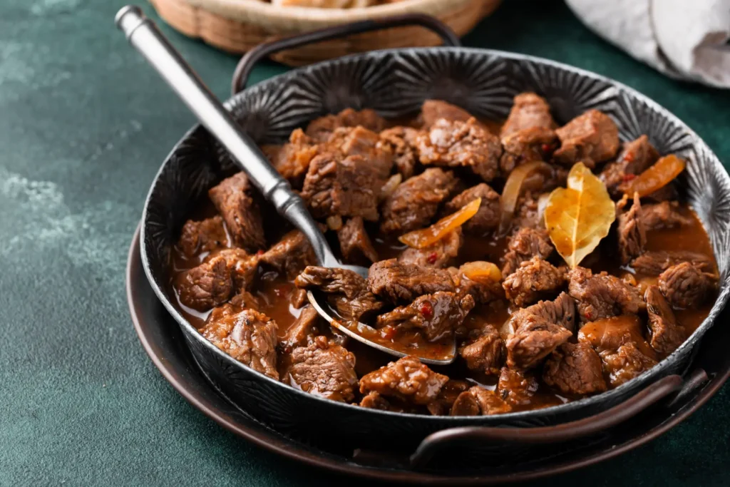 Carne assada na panela de pressão.